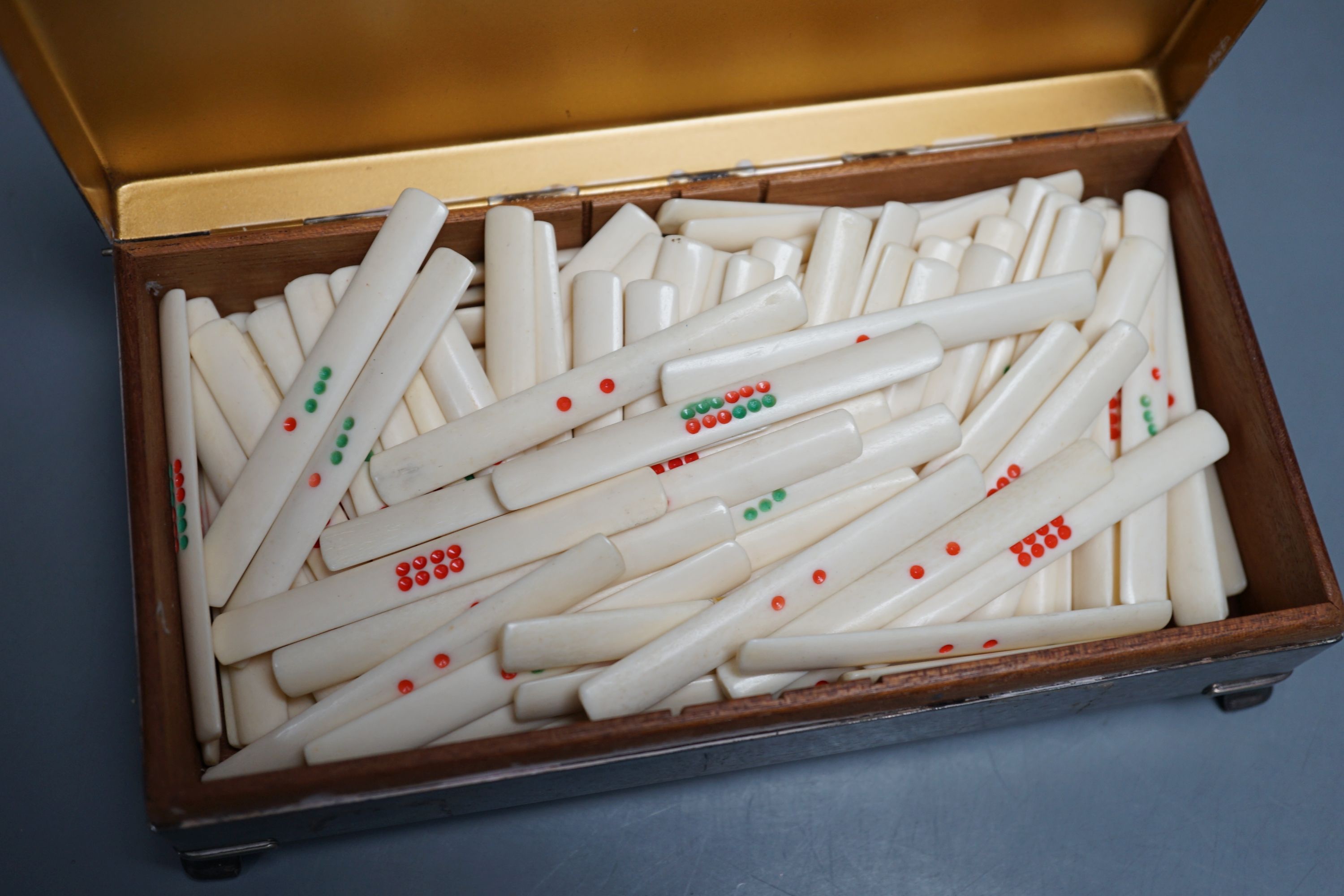 Bone set game markers, in a plated box.